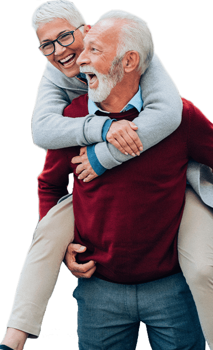 man giving his wife a piggyback ride